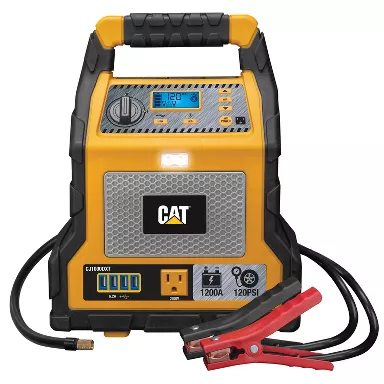 CAT battery with jumper cables attached its yellow and black