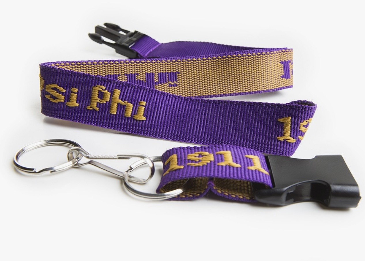 Car key and fob on purple lanyard